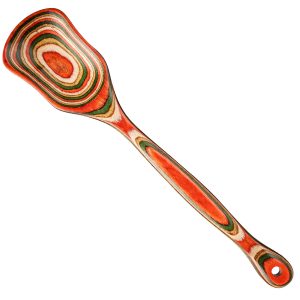 Colorful mixing spoon with red green and cream bands and a circular hanging hole on white