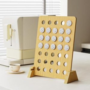 Bamboo coffee display rack with circular pod openings and two support feet, pictured upright beside a coffee machine