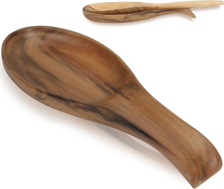 Walnut wooden spoon rest with a recessed bowl and curved handle support, shown with a spoon in an inset