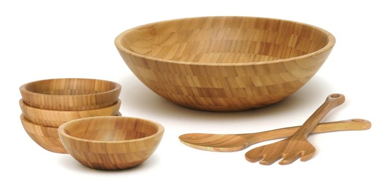Collection photo of a large bamboo salad bowl, two servers and four additional small bowls