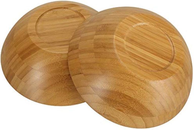 Undersides of two bamboo salad bowls showing circular bases and joined bamboo grain