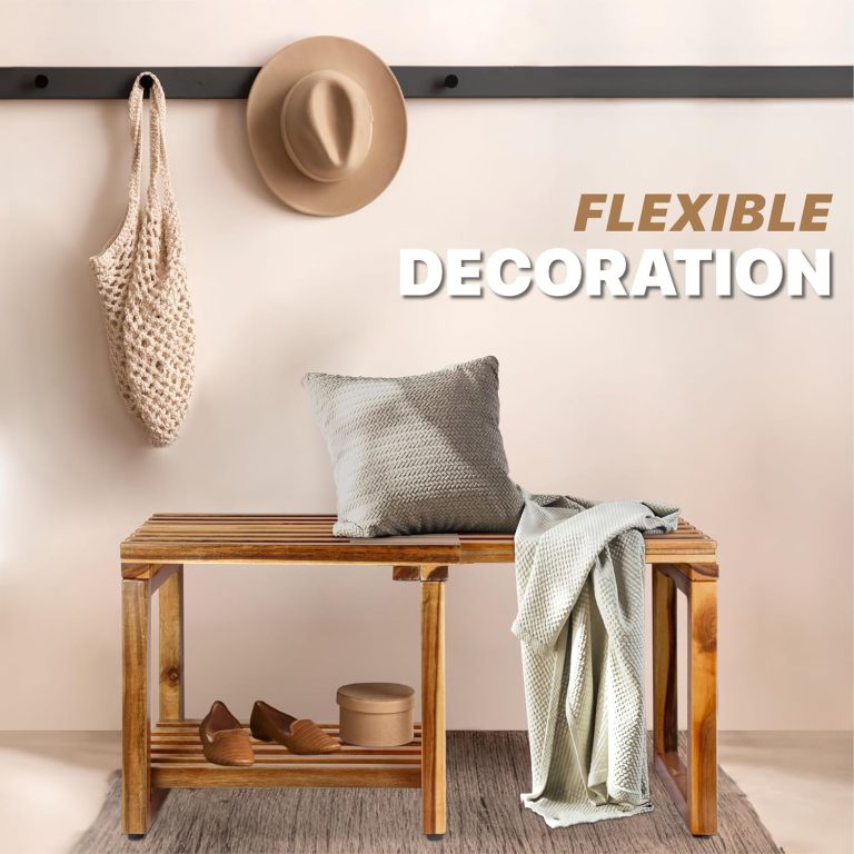 Acacia wood bench in an entryway with a cushion and throw on top and shoes on the lower shelf