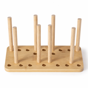 Adjustable bamboo tumbler lid organizer with a rounded base, removable pegs and visible positioning holes