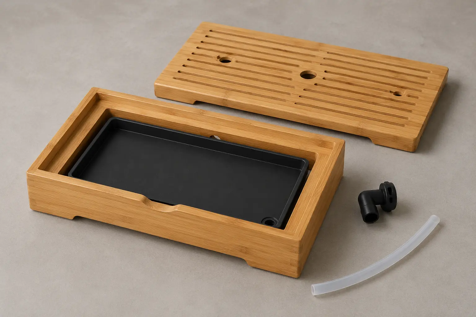 Bamboo tea tray with removable slatted top, water catchment pan and drain hose components