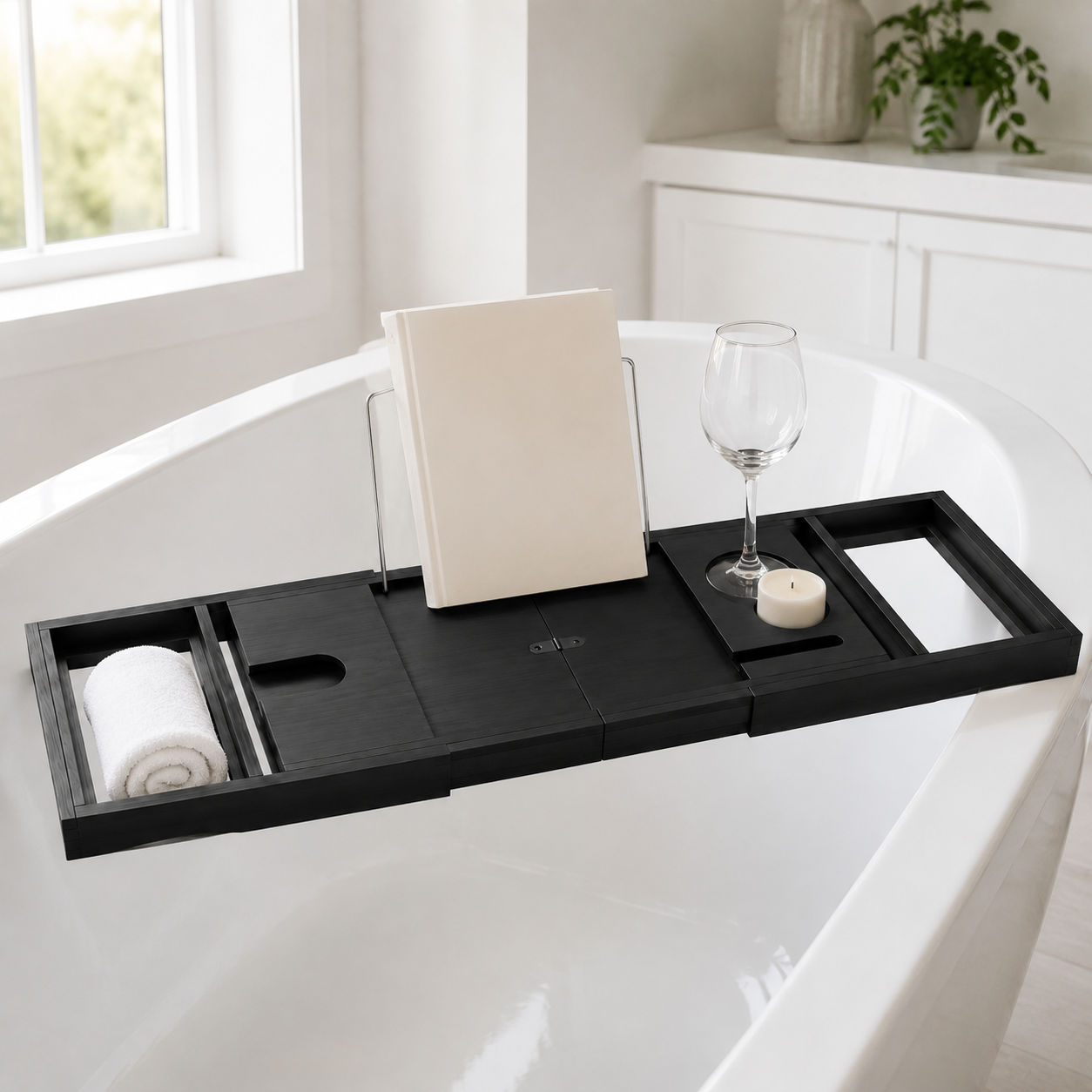 Black bathtub tray extended across a white bathtub with its sliding side supports visible